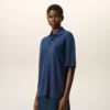 Tricou polo albastru din bumbac cu patch-uri tricotate Ami de Coeur Tricou polo albastru din bumbac cu patch-uri tricotate Ami de Coeur