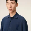 Tricou polo albastru din bumbac cu patch-uri tricotate Ami de Coeur Tricou polo albastru din bumbac cu patch-uri tricotate Ami de Coeur