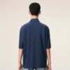 Tricou polo albastru din bumbac cu patch-uri tricotate Ami de Coeur Tricou polo albastru din bumbac cu patch-uri tricotate Ami de Coeur