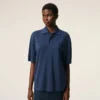 Tricou polo albastru din bumbac cu patch-uri tricotate Ami de Coeur Tricou polo albastru din bumbac cu patch-uri tricotate Ami de Coeur