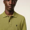 Tricou polo Ami de Coeur cu mâneci scurte din bumbac verde Tricou polo Ami de Coeur cu mâneci scurte din bumbac verde
