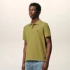 Tricou polo Ami de Coeur cu mâneci scurte din bumbac verde Tricou polo Ami de Coeur cu mâneci scurte din bumbac verde