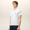 Tricou polo Ami de Coeur din bumbac alb, cu mâneci scurte Tricou polo Ami de Coeur din bumbac alb, cu mâneci scurte