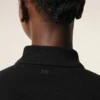 Tricou polo Ami de Coeur din bumbac negru cu imprimeu roșu Tricou polo Ami de Coeur din bumbac negru cu imprimeu roșu