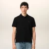 Tricou polo Ami de Coeur din bumbac negru cu imprimeu roșu Tricou polo Ami de Coeur din bumbac negru cu imprimeu roșu
