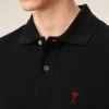 Tricou polo Ami de Coeur din bumbac negru cu imprimeu roșu Tricou polo Ami de Coeur din bumbac negru cu imprimeu roșu