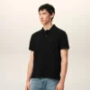 Tricou polo Ami de Coeur din bumbac negru cu imprimeu roșu Tricou polo Ami de Coeur din bumbac negru cu imprimeu roșu