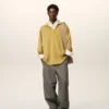 Tricou polo cu mâneci lungi din lână galbenă Tricou polo cu mâneci lungi din lână galbenă