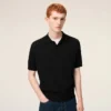 Tricou polo negru din tricot cu mâneci scurte Tricou polo negru din tricot cu mâneci scurte