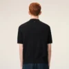 Tricou polo negru din tricot cu mâneci scurte Tricou polo negru din tricot cu mâneci scurte